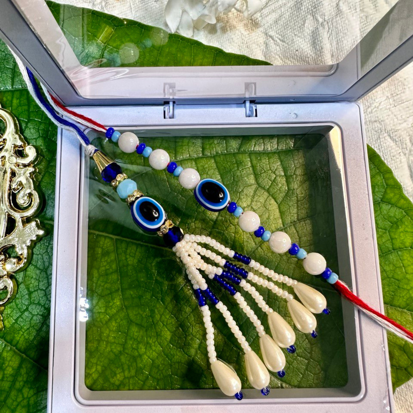 Evil Eye Bhaiya Bhabhi Rakhi Set with chocolates