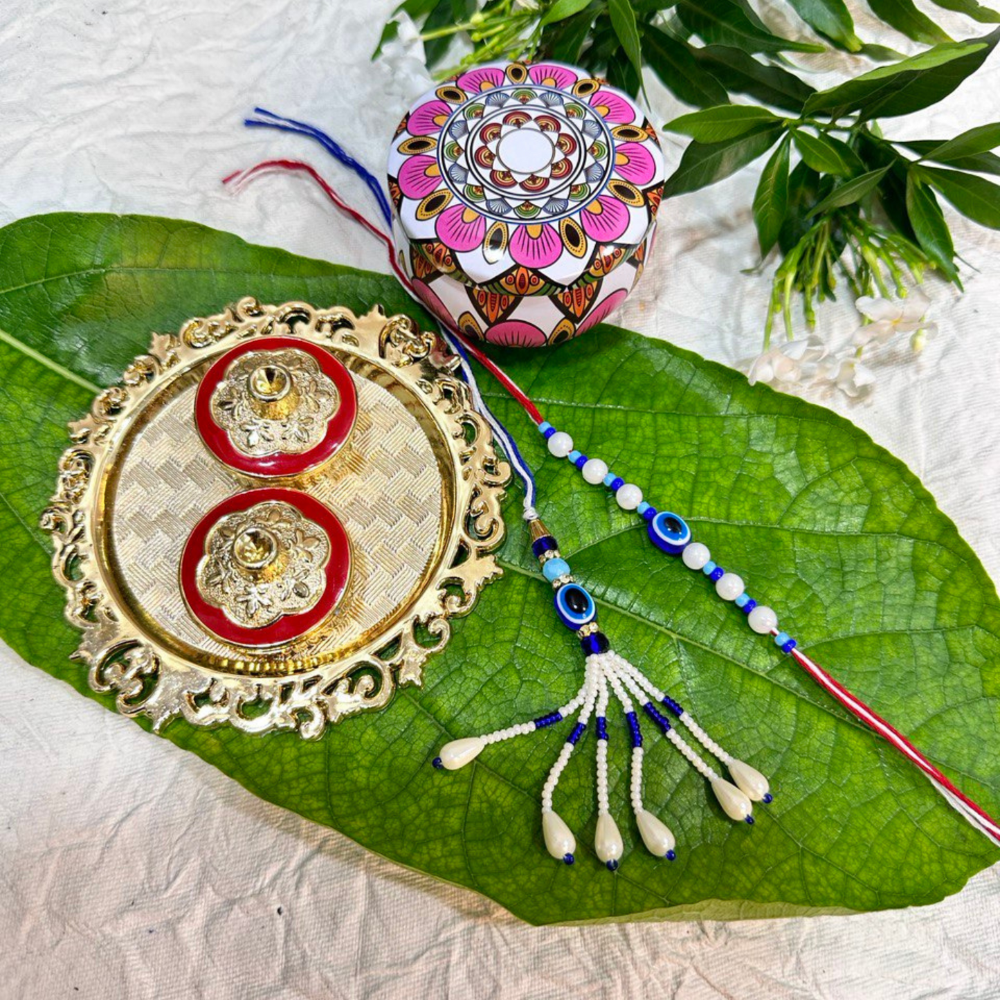 Evil Eye Bhaiya Bhabhi Rakhi Set with chocolates